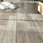 Load image into Gallery viewer, Mercury Oak Laminate Flooring 10 in. W x 55 in. L 8mm Laminate Flooring (21.75 sq.ft./case)