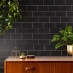 Load image into Gallery viewer, Merola Tile Crown Heights Matte Black 3 inch x 6 inch Ceramic Wall Tile 5.72 sq. ft./case – Textured Matte Subway Finish