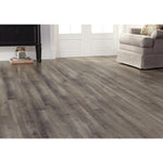 Charger l'image dans la visionneuse de galerie, Revêtement de sol stratifié aspect bois gris TrafficMaster Harrison Oak 12 mm x 7,6 po l x 54,45 po L (17,24 pi²/boîte) (Copie)