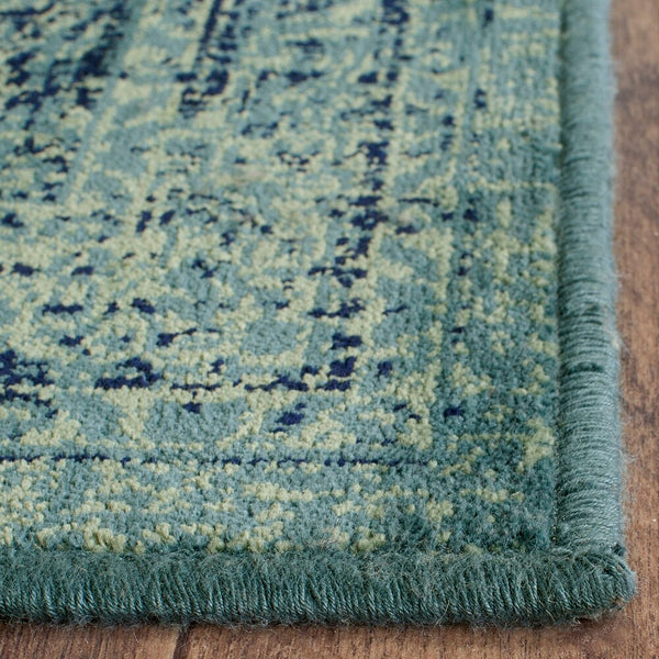 Safavieh Vintage Melinda Turquoise / Multi 5 ft. 3-inch x 7 ft. 6-inch Oval Indoor Area Rug