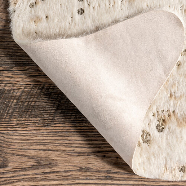 nuLOOM Iraida Faux Cowhide Off-White 4 ft. x 5 ft. Indoor Area Rug