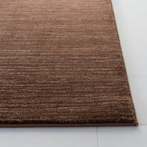 Aaishah Brown Area Rug
