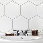Load image into Gallery viewer, Merola Tile Textile Basic Hex White Porcelain Tile 8.63 inch x 9.88 inch – 11.5 sq. ft. per Case Glossy Stone-Look Finish