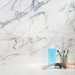 Charger l'image dans la visionneuse de galerie, Ivy Hill Tile Calacatta Indigo Polished Porcelain Tile 12 inch x 24 inch 11.62 sq. ft./Case Marble Look Glossy Floor and Wall Tile