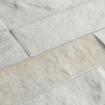 Load image into Gallery viewer, Merola Tile Ordino White Porcelain Tile 0.34 inch Thick 3.25 inch x 17.5 inch 9.6 sq. ft./Case Textured Stone Look Wall Tile