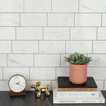 Load image into Gallery viewer, Merola Tile Classico Carrara Glossy Ceramic Subway Wall Tile 0.34 inch Thick 3 inch Wide 6.03 sq. ft. per Case – Marble Look High Sheen Finish