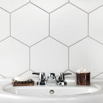 Load image into Gallery viewer, Merola Tile Textile Basic Hex White Porcelain Tile 8.63 inch x 9.88 inch – 11.5 sq. ft. per Case Glossy Stone-Look Finish